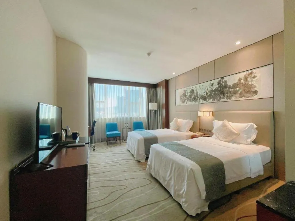Bed in Grand Soluxe Zhongyou Hotel Shenzhen