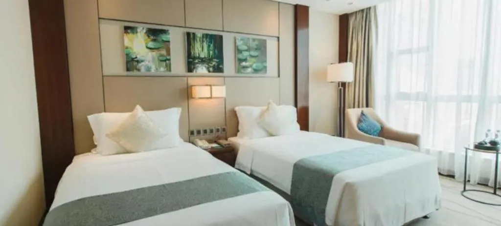 Bed in Grand Soluxe Zhongyou Hotel Shenzhen