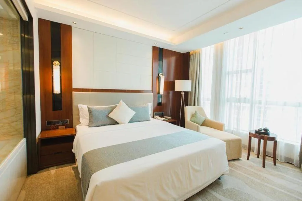 Bed in Grand Soluxe Zhongyou Hotel Shenzhen