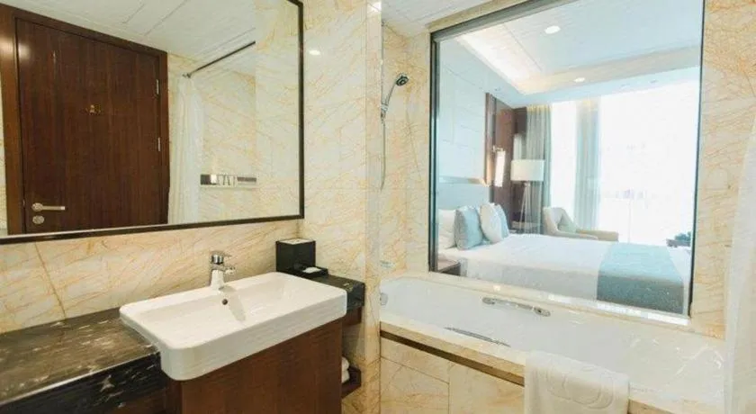 Bed in Grand Soluxe Zhongyou Hotel Shenzhen