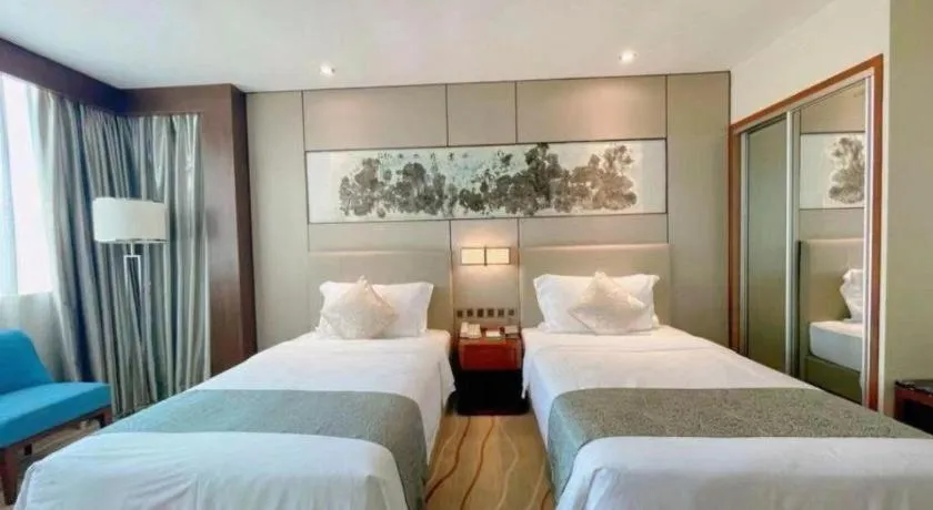 Bed in Grand Soluxe Zhongyou Hotel Shenzhen