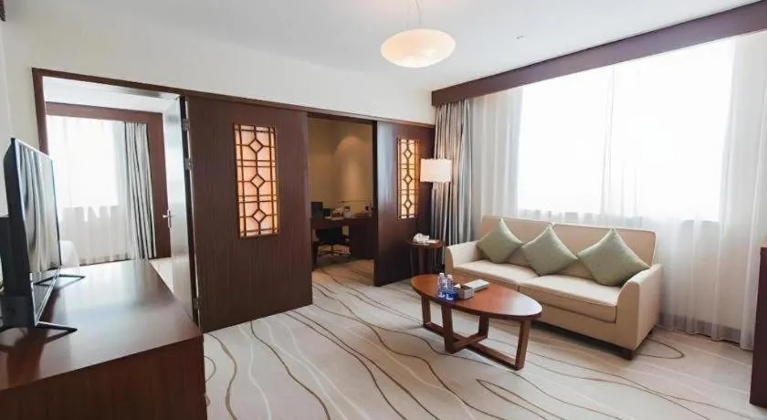 Bed in Grand Soluxe Zhongyou Hotel Shenzhen