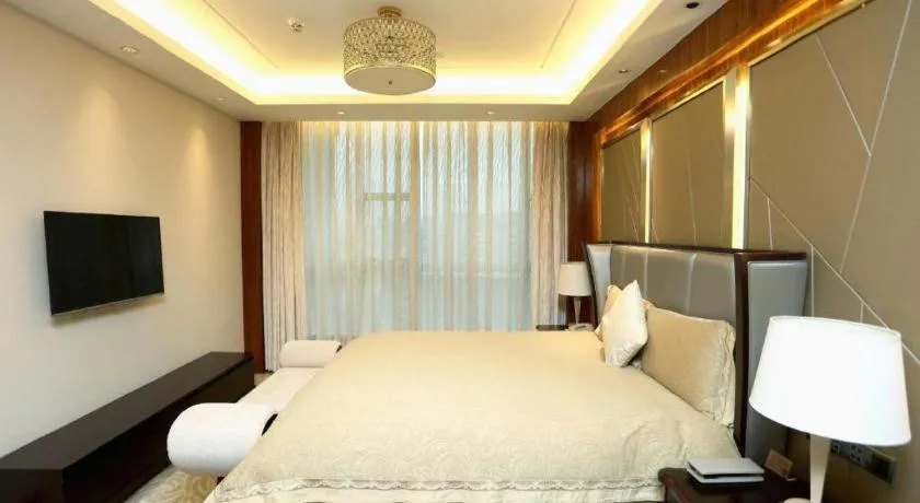 Bed in Grand Soluxe Zhongyou Hotel Shenzhen