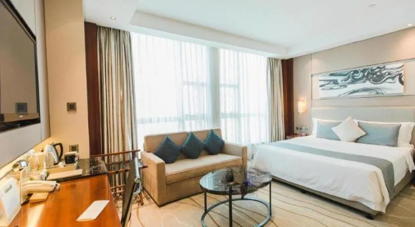 Bed in Grand Soluxe Zhongyou Hotel Shenzhen