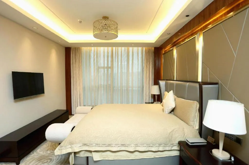 Bed in Grand Soluxe Zhongyou Hotel Shenzhen