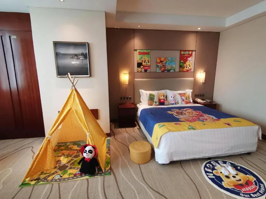 Bed in Grand Soluxe Zhongyou Hotel Shenzhen