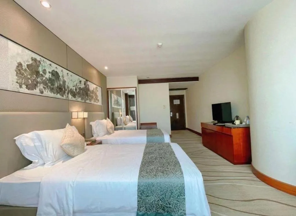 Bed in Grand Soluxe Zhongyou Hotel Shenzhen