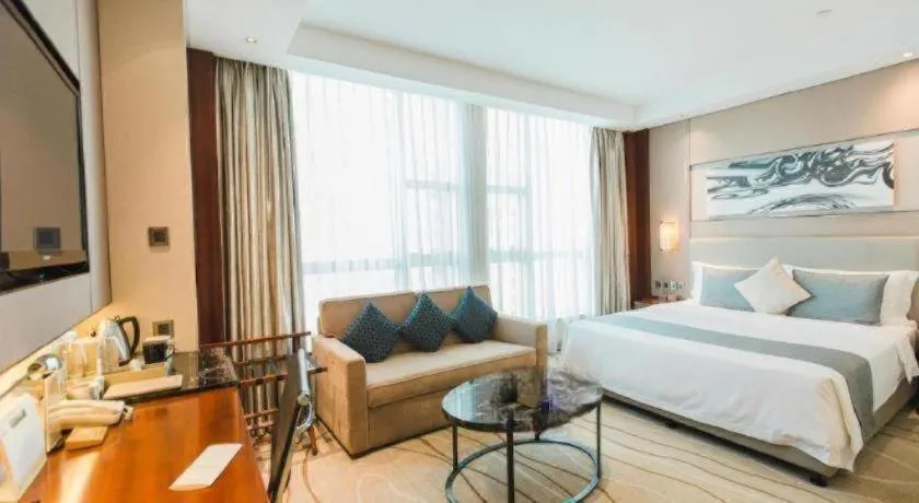 Bed in Grand Soluxe Zhongyou Hotel Shenzhen