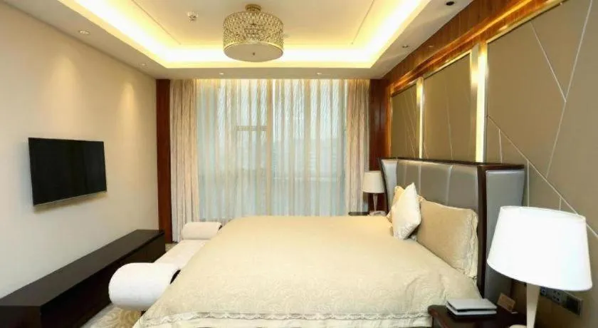 Bed in Grand Soluxe Zhongyou Hotel Shenzhen