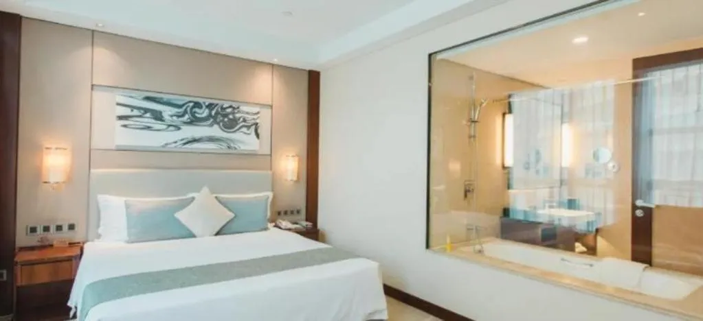 Bed in Grand Soluxe Zhongyou Hotel Shenzhen