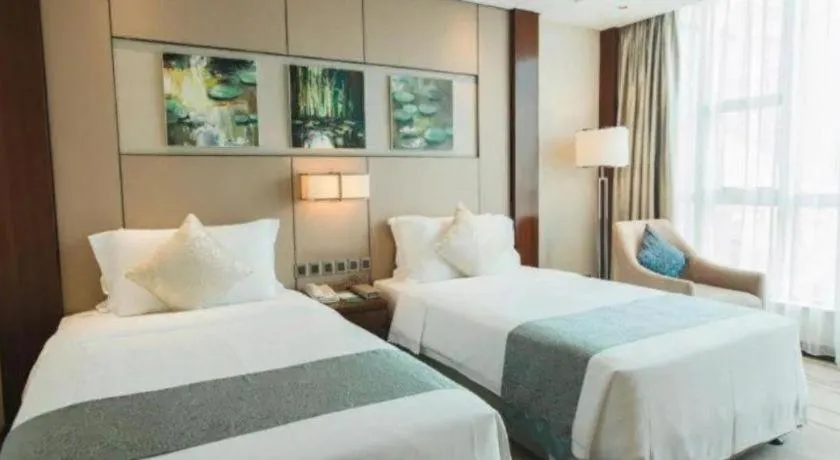 Bed in Grand Soluxe Zhongyou Hotel Shenzhen