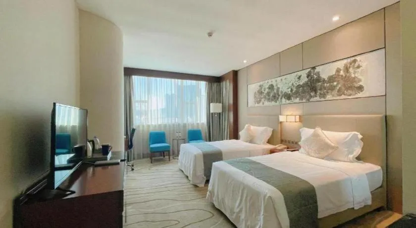 Bed in Grand Soluxe Zhongyou Hotel Shenzhen