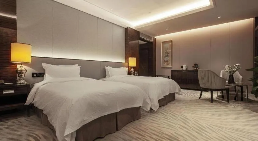 Bed in Nanjing Lakehome Hotels and Resorts