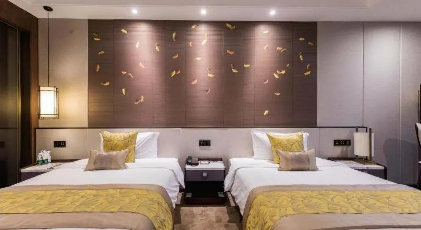 Bed in Nanjing Lakehome Hotels and Resorts