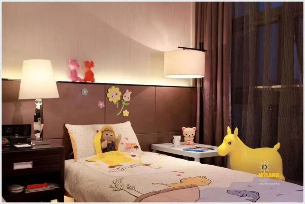 Bed in Nanjing Lakehome Hotels and Resorts