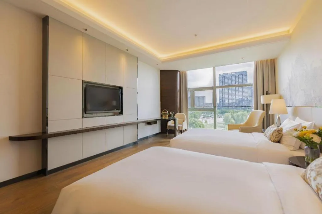 Bed in Nanjing Lakehome Hotels and Resorts