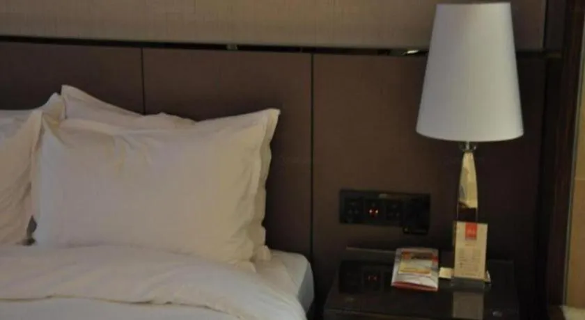 Bed in Nanjing Lakehome Hotels and Resorts