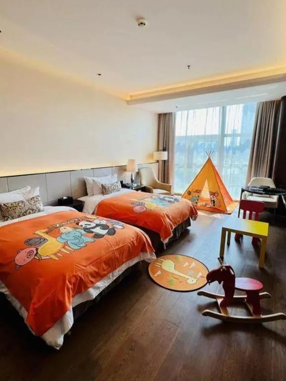 Bed in Nanjing Lakehome Hotels and Resorts