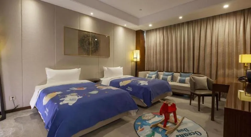 Bed in Nanjing Lakehome Hotels and Resorts