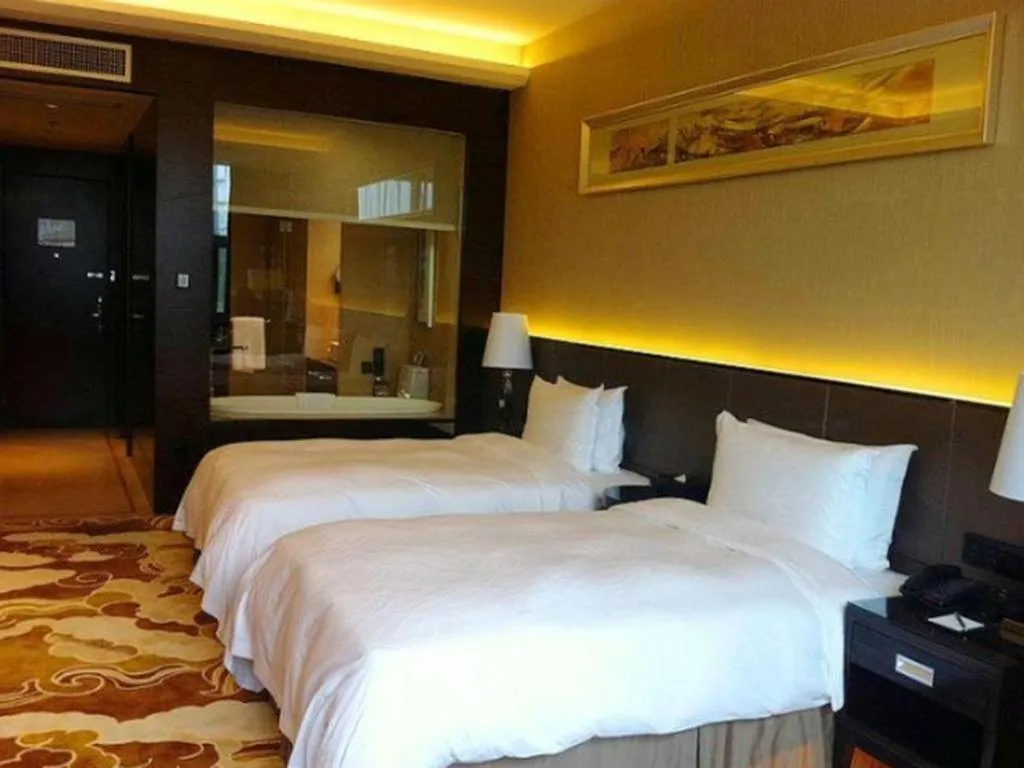 Bed in Nanjing Lakehome Hotels and Resorts