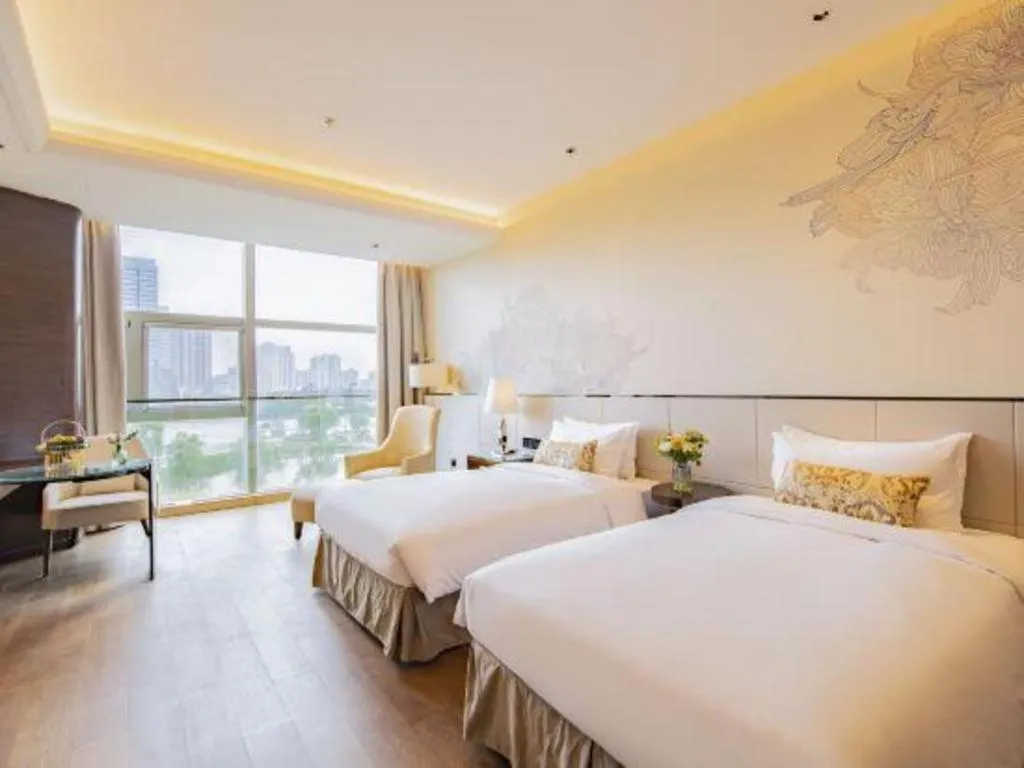 Bed in Nanjing Lakehome Hotels and Resorts