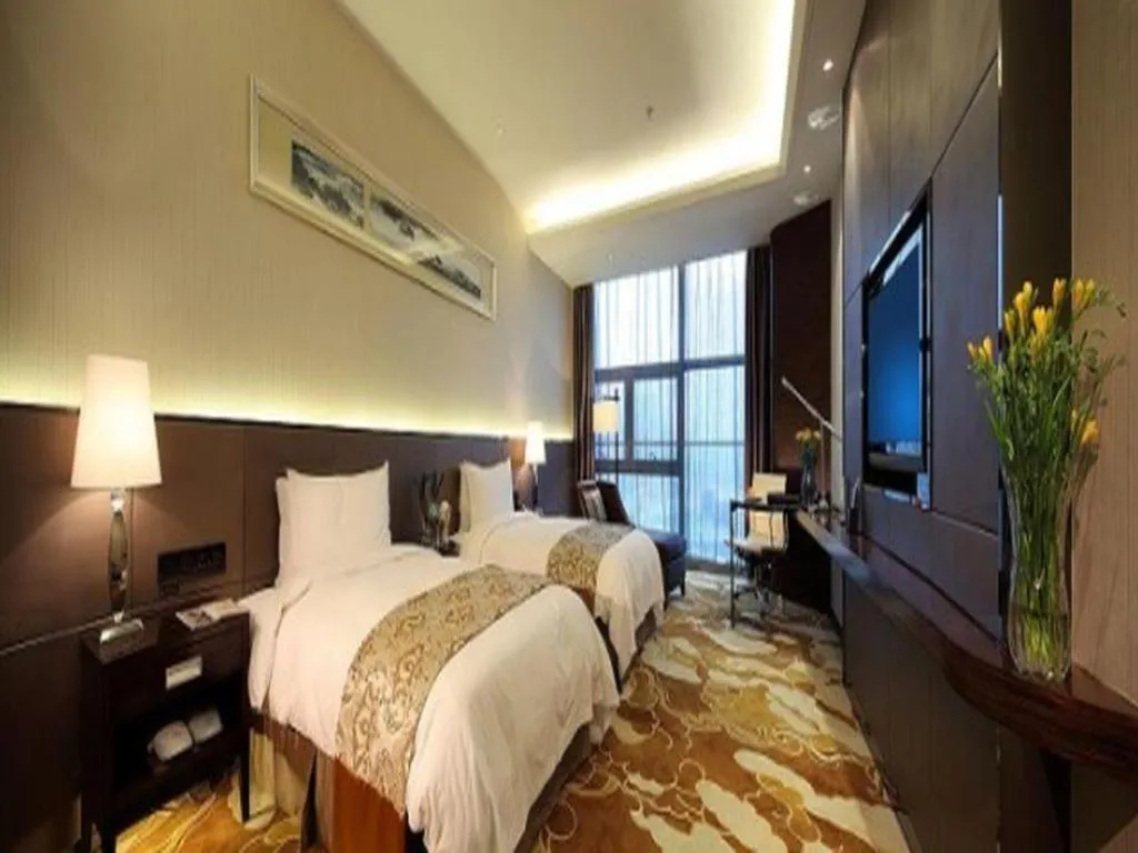 Bed in Nanjing Lakehome Hotels and Resorts