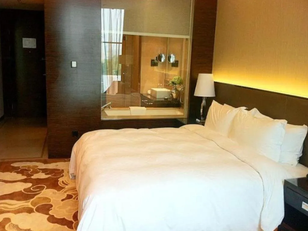 Bed in Nanjing Lakehome Hotels and Resorts
