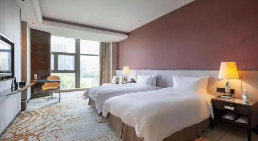 Bed in Nanjing Lakehome Hotels and Resorts