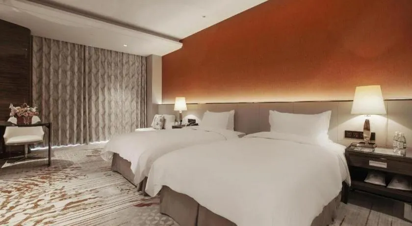 Bed in Nanjing Lakehome Hotels and Resorts