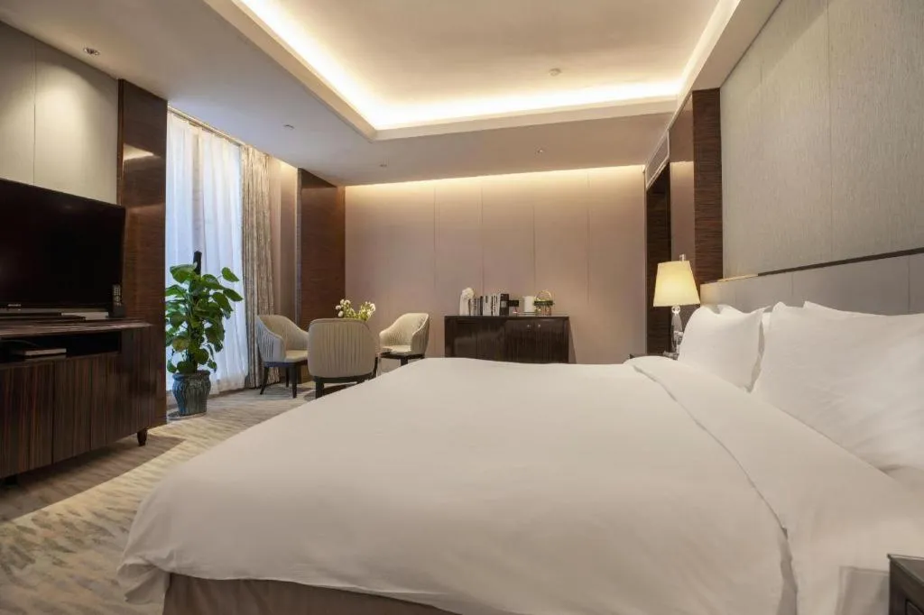 Bed in Nanjing Lakehome Hotels and Resorts