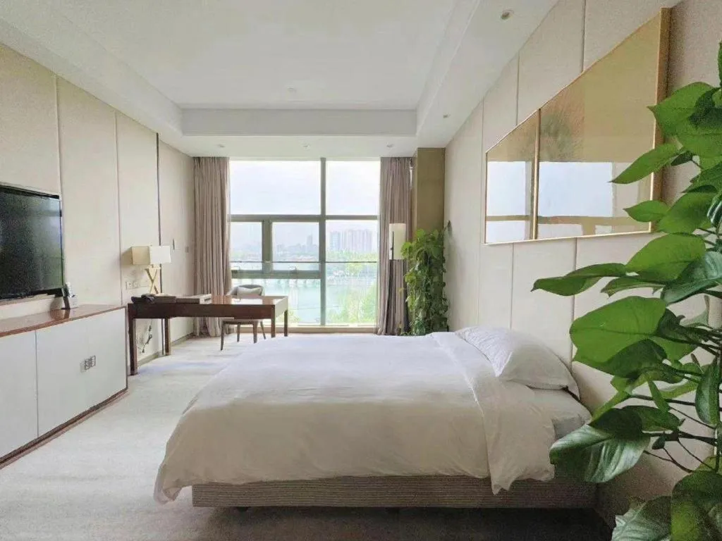 Bed in Nanjing Lakehome Hotels and Resorts