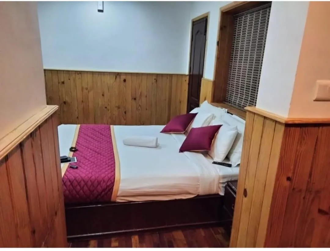 Bed in Tree Elanza, Unit of Santhi Ayurvedic Resort