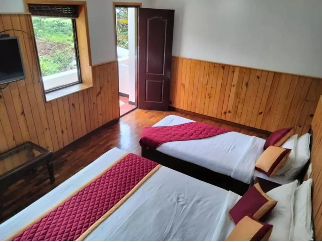 Bed in Tree Elanza, Unit of Santhi Ayurvedic Resort