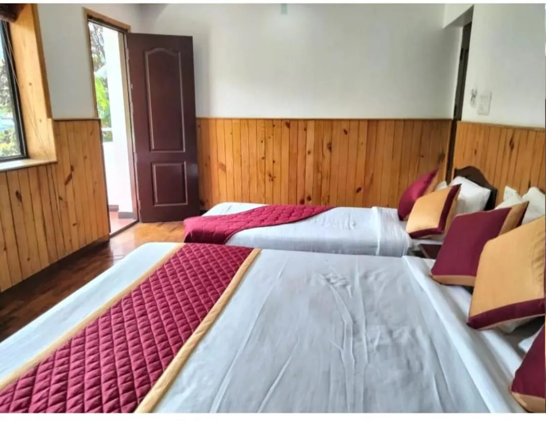 Bed in Tree Elanza, Unit of Santhi Ayurvedic Resort