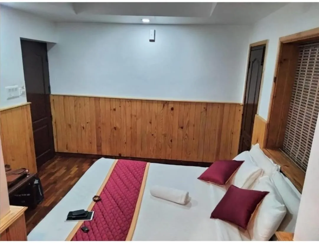 Bed in Tree Elanza, Unit of Santhi Ayurvedic Resort