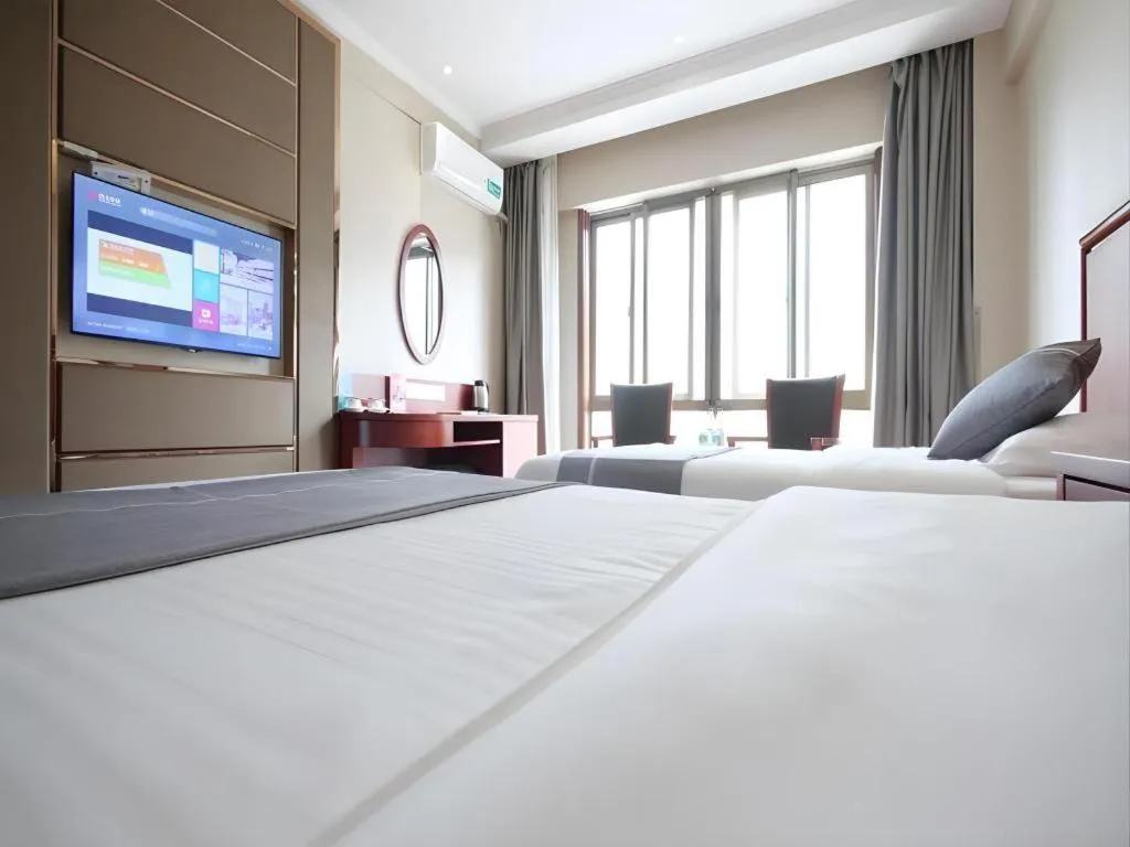 Bed in GreenTree Inn ChiZhou QinGYAng Miaoqian Road Rongxing Building Business Hotel