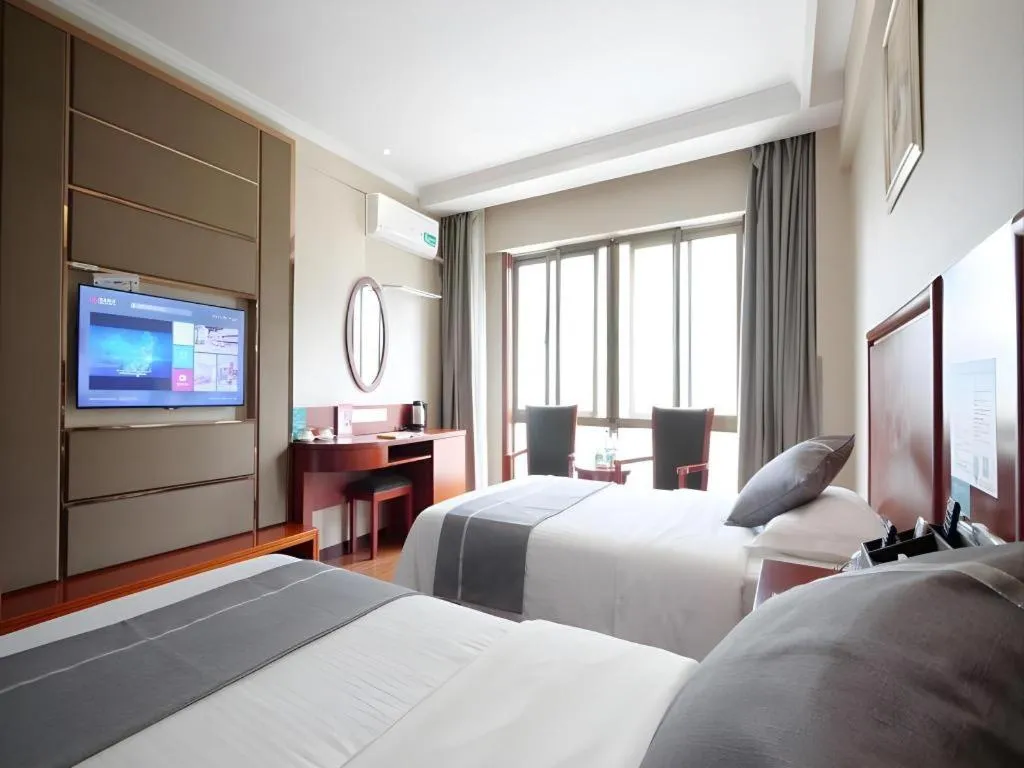 Bed in GreenTree Inn ChiZhou QinGYAng Miaoqian Road Rongxing Building Business Hotel