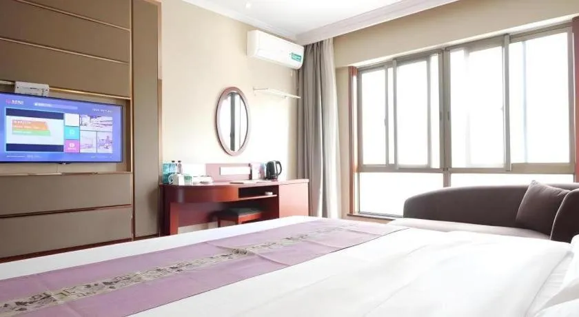 Bed in GreenTree Inn ChiZhou QinGYAng Miaoqian Road Rongxing Building Business Hotel