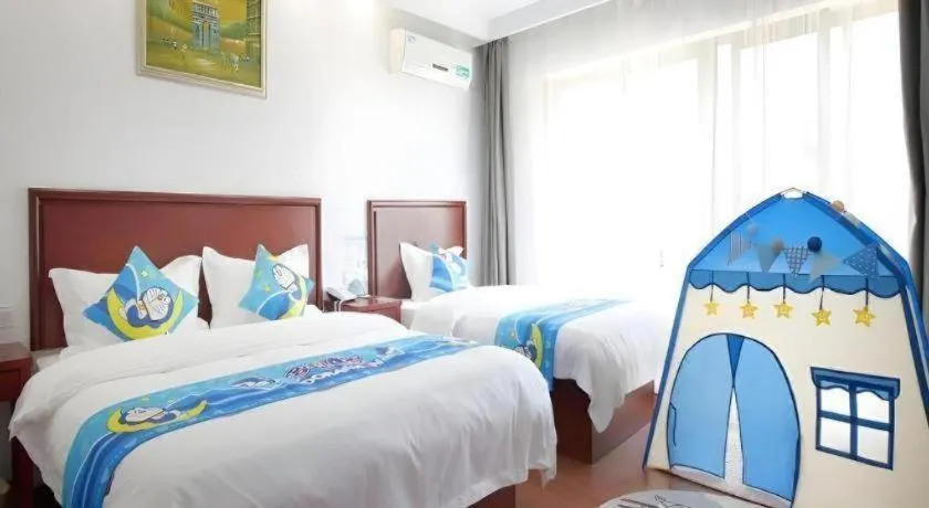Bed in GreenTree Inn ChiZhou QinGYAng Miaoqian Road Rongxing Building Business Hotel