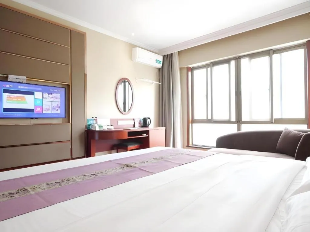 Bed in GreenTree Inn ChiZhou QinGYAng Miaoqian Road Rongxing Building Business Hotel