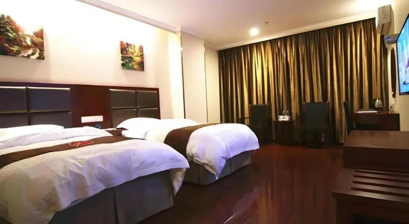 Bed in GreenTree Inn ChaoHu Tianchao Plaza Express Hotel