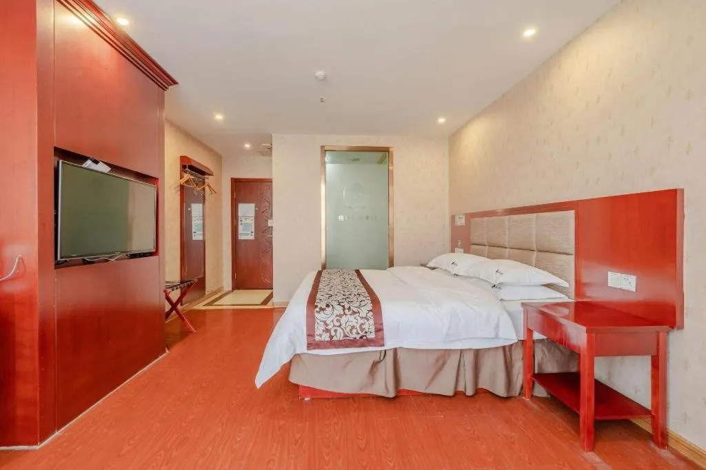 Bed in GreenTree Inn Chuzhou City Quanjiao County High-Speed Italy Trade City Business Hotel