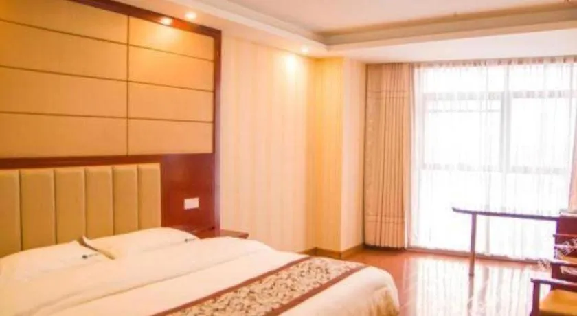 Bed in GreenTree Inn Chuzhou City Quanjiao County High-Speed Italy Trade City Business Hotel