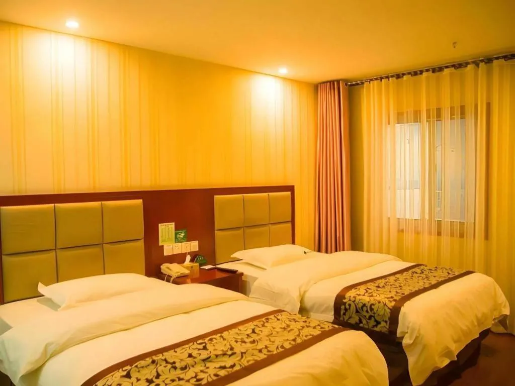 Bed in GreenTree Inn Chuzhou City Quanjiao County High-Speed Italy Trade City Business Hotel