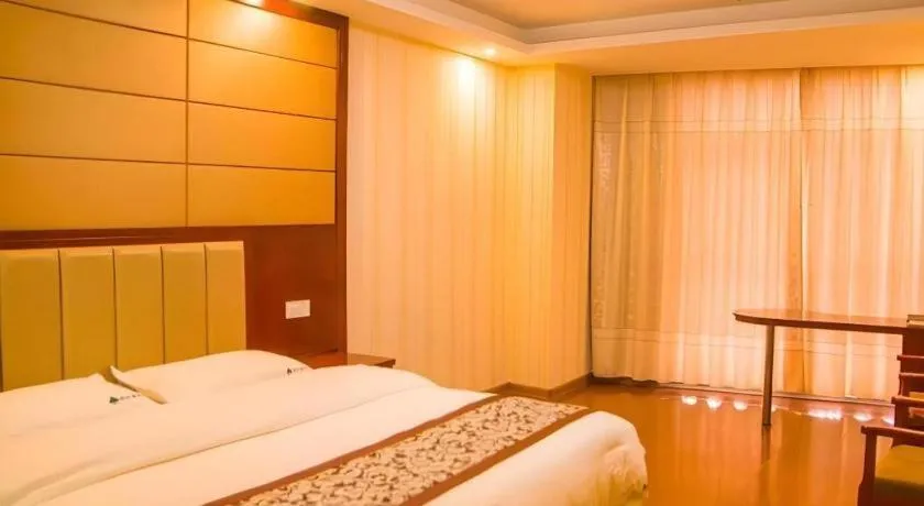Bed in GreenTree Inn Chuzhou City Quanjiao County High-Speed Italy Trade City Business Hotel