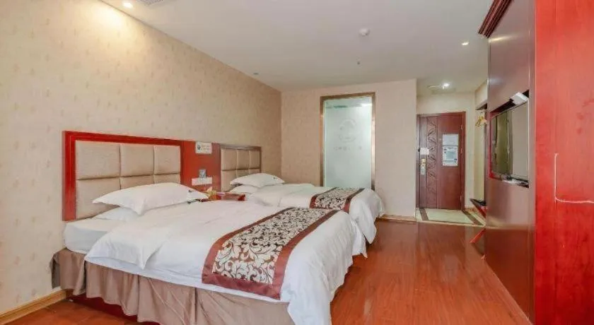 Bed in GreenTree Inn Chuzhou City Quanjiao County High-Speed Italy Trade City Business Hotel