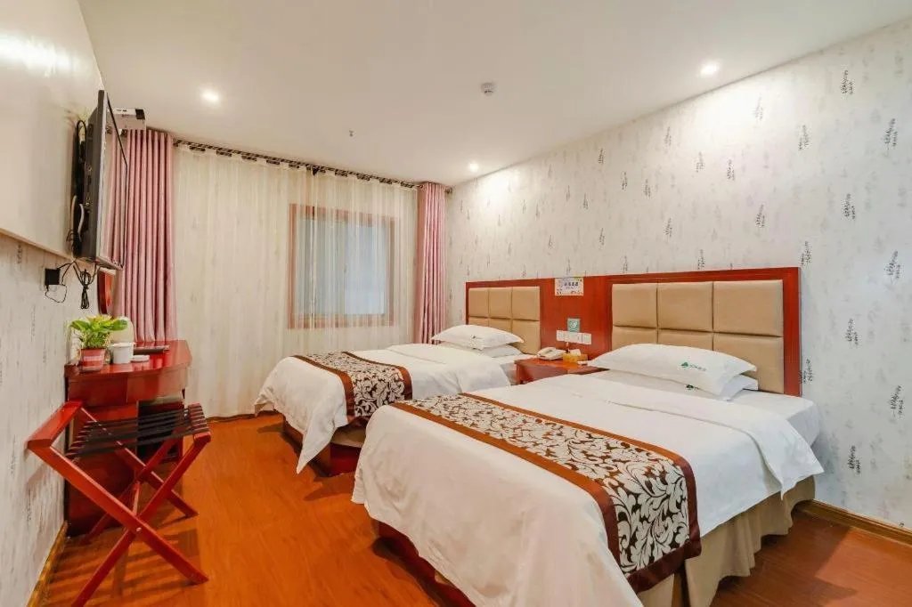 Bed in GreenTree Inn Chuzhou City Quanjiao County High-Speed Italy Trade City Business Hotel