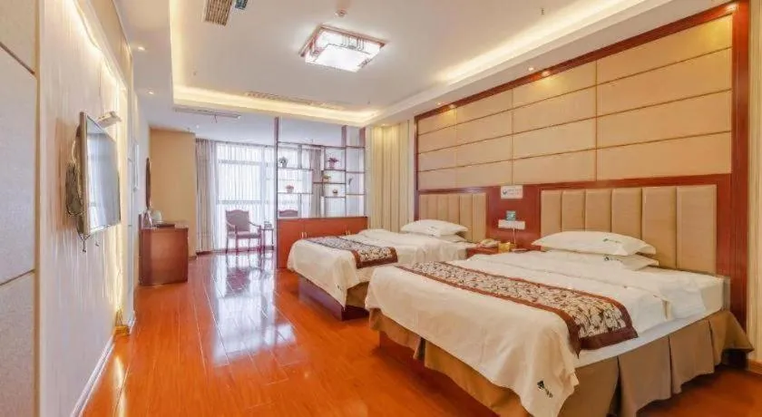 Bed in GreenTree Inn Chuzhou City Quanjiao County High-Speed Italy Trade City Business Hotel