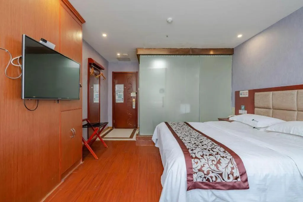 Bed in GreenTree Inn Chuzhou City Quanjiao County High-Speed Italy Trade City Business Hotel