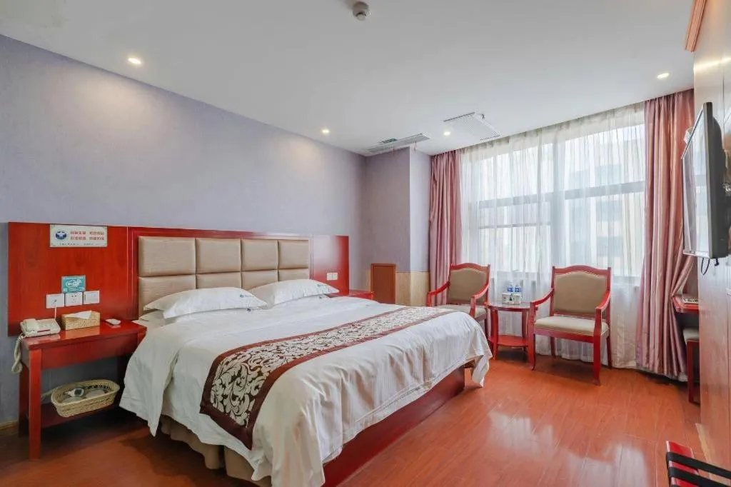 Bed in GreenTree Inn Chuzhou City Quanjiao County High-Speed Italy Trade City Business Hotel